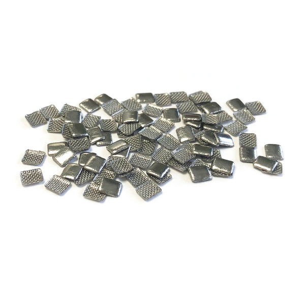 Orthodontic Bonding Pads are made with orthodontic stainless steel foil mesh laminate.